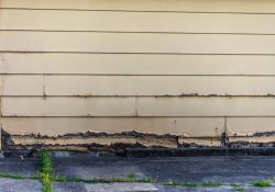 Smithsburg Siding Contractor: rotting old clapboard siding on an old garage
