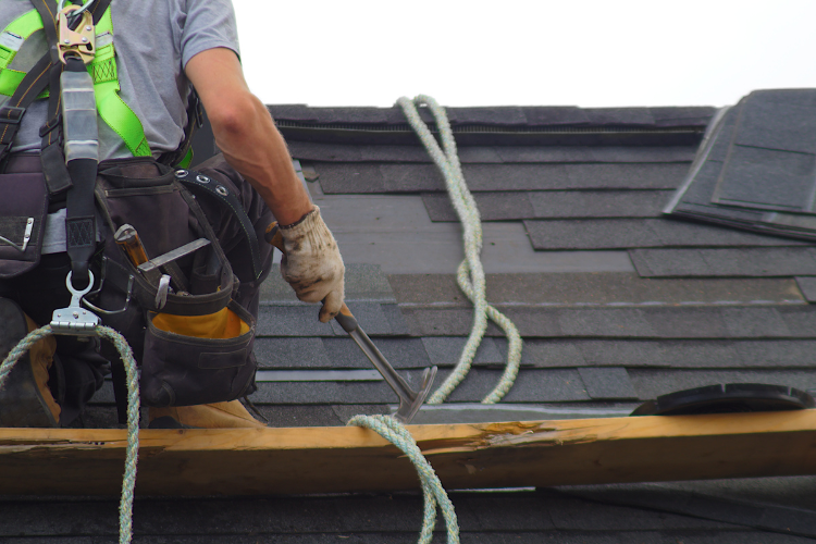 Roofer repairing roof in Boonsboro