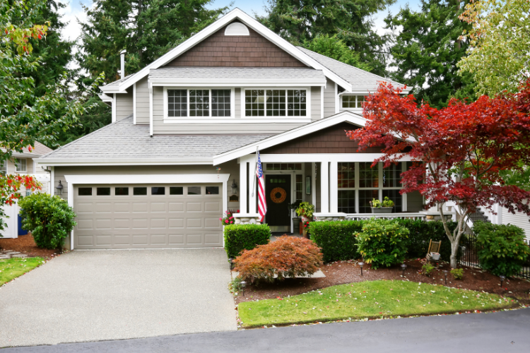 Country home showcasing upgraded siding and roofing for improved curb appeal in Middletown, completed by Complete Builders.
