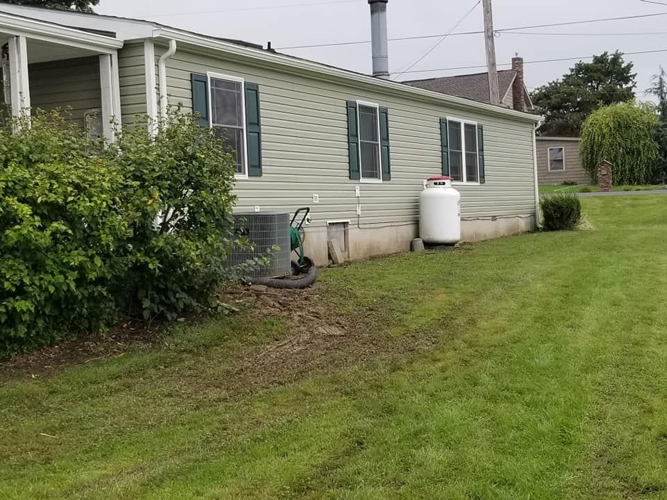 Finished home exterior with new siding
