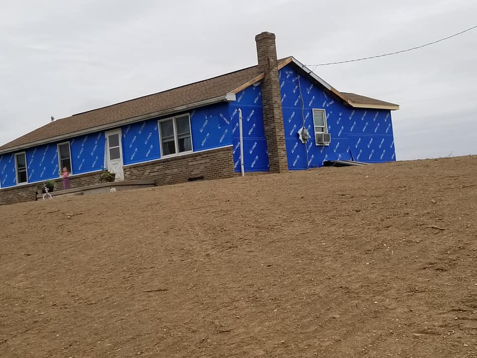 New vinyl siding installation