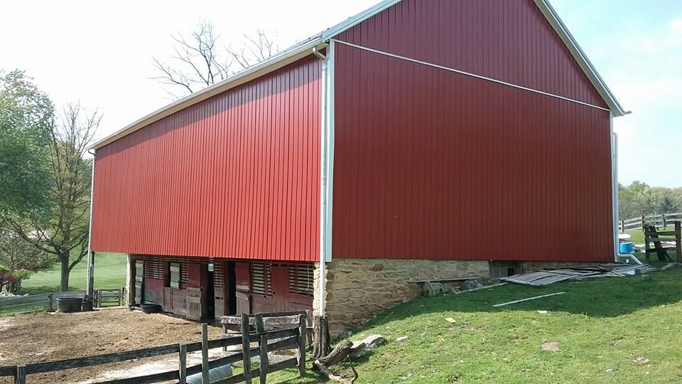 Red colored siding on shed type building